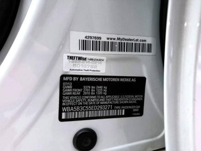 Photo of 2014 White BMW 535