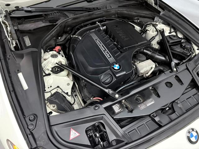 Photo of 2014 White BMW 535