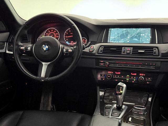 Photo of 2014 White BMW 535