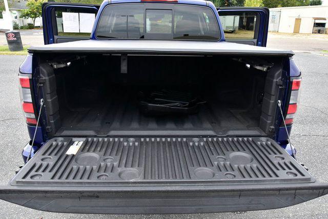 Photo of 2022 Deep Blue Pearl Nissan Frontier