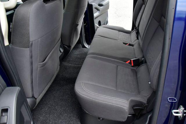 Photo of 2022 Deep Blue Pearl Nissan Frontier