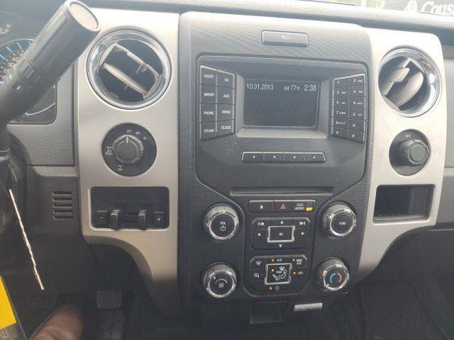 Photo of 2014 Blue Jeans Metallic Ford F-150
