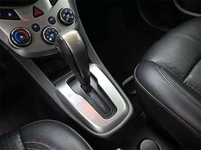Photo of 2014 Crystal Red Tintcoat Chevrolet Sonic
