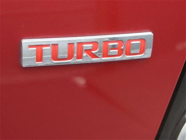 Photo of 2014 Crystal Red Tintcoat Chevrolet Sonic