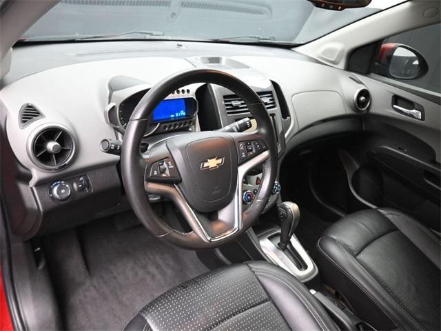 Photo of 2014 Crystal Red Tintcoat Chevrolet Sonic