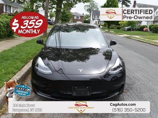 Photo of 2023 Solid Black Tesla Model 3