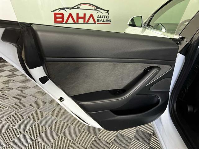 Photo of 2020 Pearl White Multi-Coat Tesla Model 3