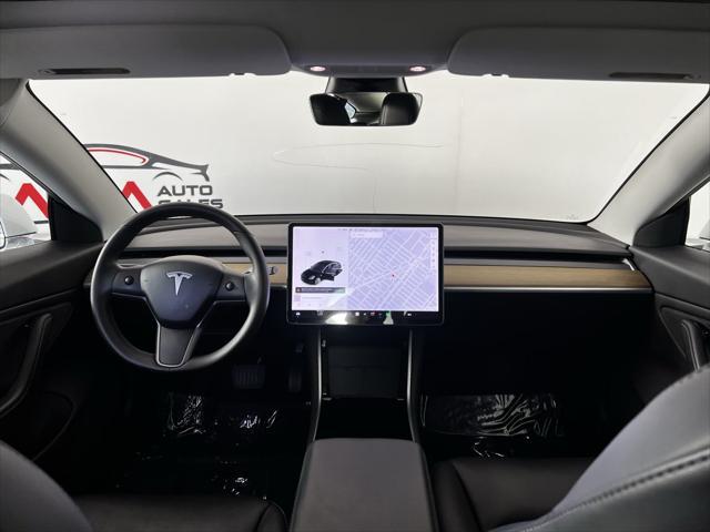 Photo of 2020 Pearl White Multi-Coat Tesla Model 3