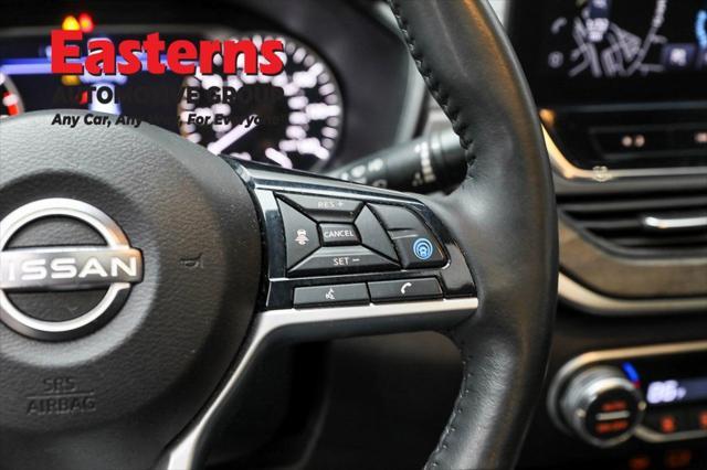 Photo of 2023 Pearl White Tricoat Nissan Altima