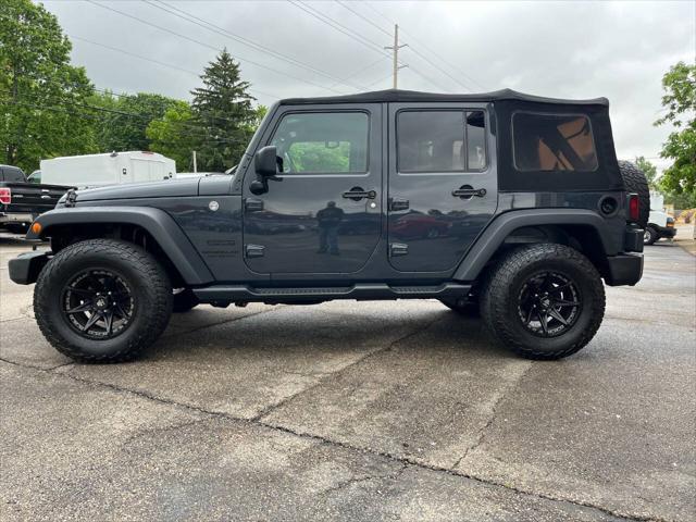 Photo of 2016 Gray Jeep Wrangler Unlimited
