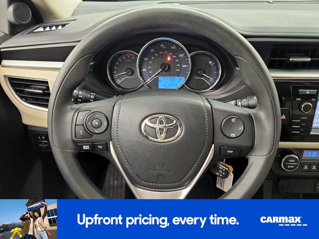 Photo of 2015 White Toyota Corolla