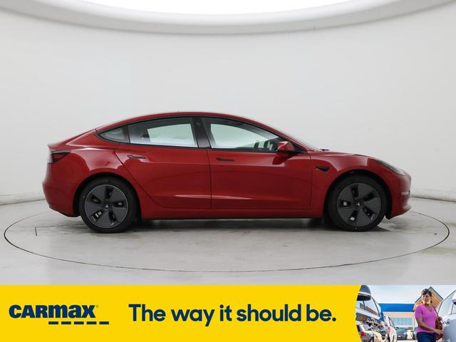 Photo of 2021 Burgundy Tesla Model 3