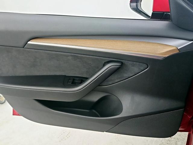 Photo of 2021 Burgundy Tesla Model 3