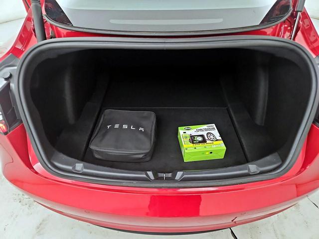 Photo of 2021 Burgundy Tesla Model 3