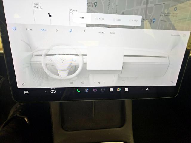 Photo of 2021 Burgundy Tesla Model 3