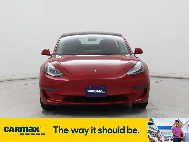 Photo of 2021 Burgundy Tesla Model 3