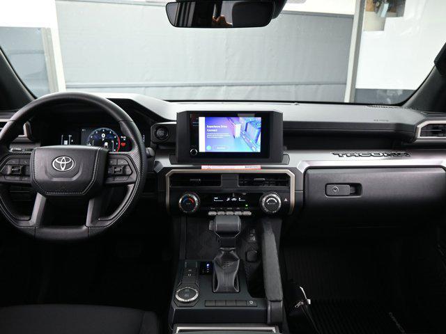 Photo of 2025 Black Fabric w/Smoke Silver Toyota Tacoma