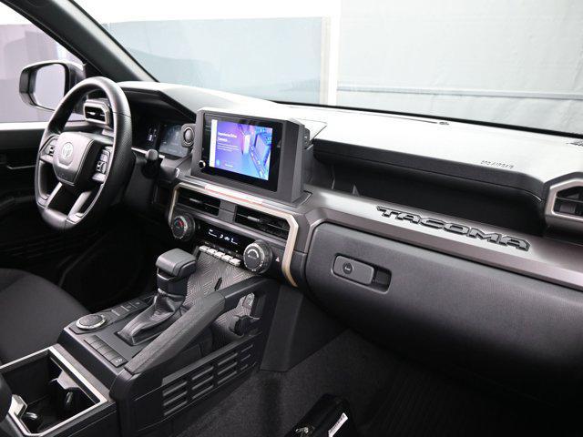Photo of 2025 Black Fabric w/Smoke Silver Toyota Tacoma