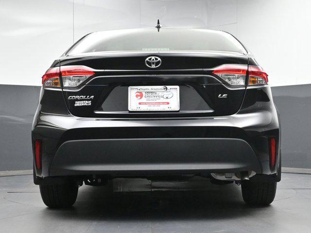 Photo of 2025 Midnight Black Metallic Toyota Corolla