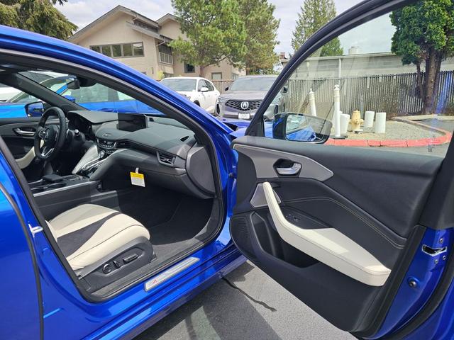 Photo of 2025 Apex Blue Pearl Acura TLX