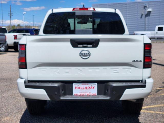 Photo of 2025 Glacier White Nissan Frontier