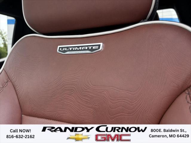 Photo of 2023 White Frost Tricoat GMC Sierra 1500