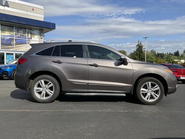 Photo of 2013 Amber Brownstone Acura RDX