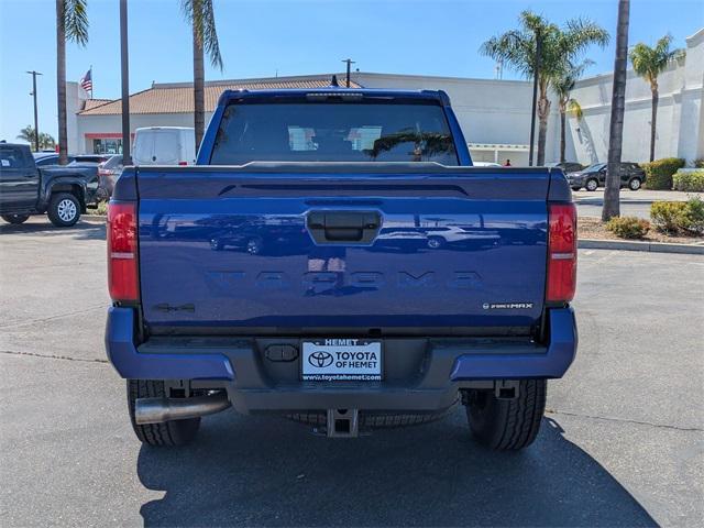 Photo of 2025 Blue Crush Metallic Toyota Tacoma