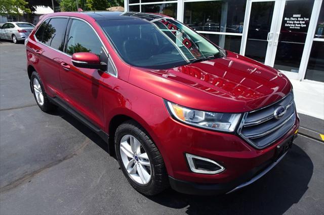 Photo of 2017 Ruby Red Metallic Tinted Clearcoat Ford Edge