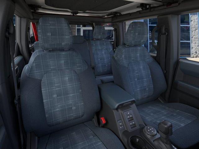 Photo of 2025 Ruby Red Metallic Tinted Clearcoat Ford Bronco