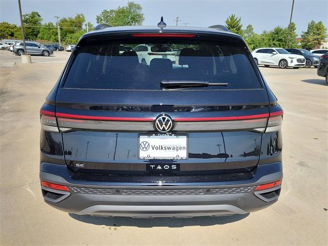 Photo of 2025 Deep Black Pearl Effect Volkswagen Taos