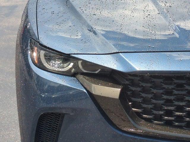 Photo of 2025 Ingot Blue Metallic Mazda CX-50