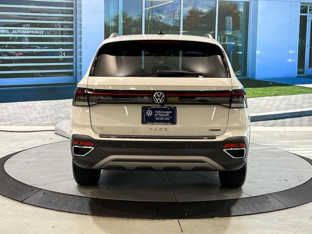 Photo of 2025 Pure White Volkswagen Taos