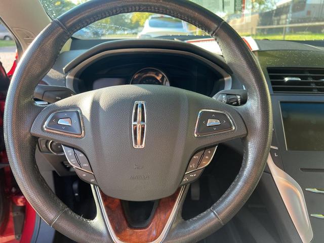 Photo of 2014 Ruby Red Metallic Tinted Clearcoat Lincoln MKZ Hybrid