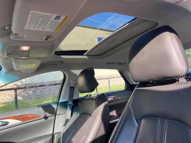 Photo of 2014 Ruby Red Metallic Tinted Clearcoat Lincoln MKZ Hybrid