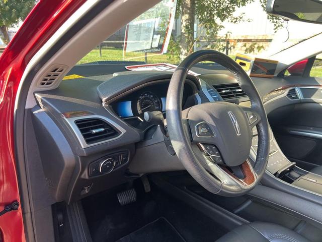 Photo of 2014 Ruby Red Metallic Tinted Clearcoat Lincoln MKZ Hybrid
