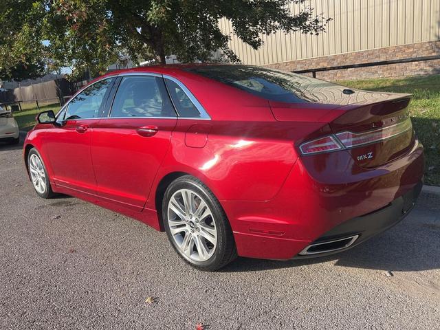Photo of 2014 Ruby Red Metallic Tinted Clearcoat Lincoln MKZ Hybrid
