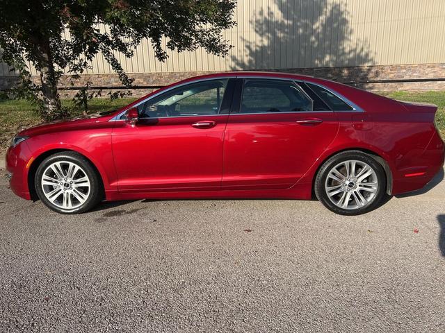 Photo of 2014 Ruby Red Metallic Tinted Clearcoat Lincoln MKZ Hybrid