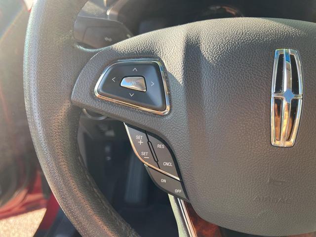 Photo of 2014 Ruby Red Metallic Tinted Clearcoat Lincoln MKZ Hybrid