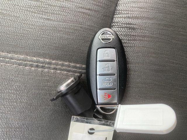 Photo of 2014 Red Brick Nissan Sentra