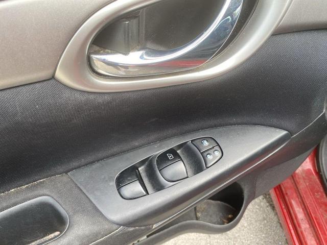 Photo of 2014 Red Brick Nissan Sentra