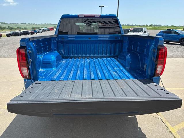Photo of 2024 Dynamic Blue Metallic GMC Sierra 1500