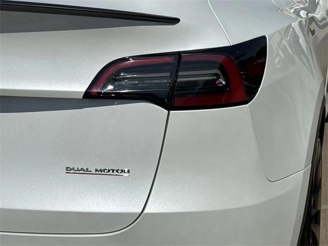 Photo of 2022 Pearl White Multi-Coat Tesla Model Y