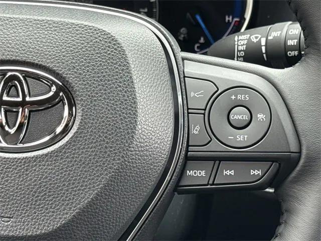 Photo of 2025 White Toyota RAV4 Hybrid