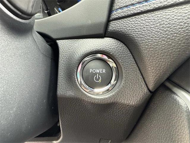 Photo of 2025 White Toyota RAV4 Hybrid