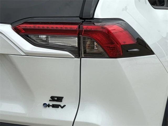 Photo of 2025 White Toyota RAV4 Hybrid
