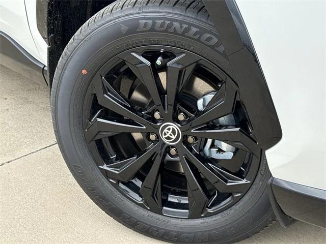 Photo of 2025 White Toyota RAV4 Hybrid