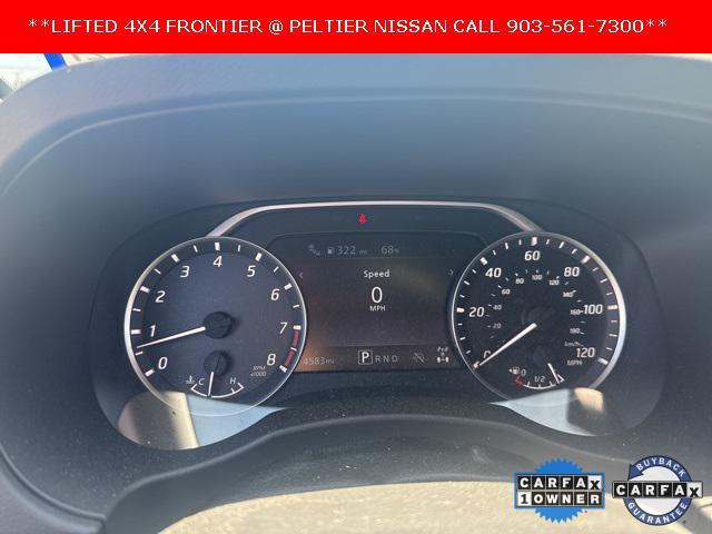 Photo of 2025 Glacier White Nissan Frontier