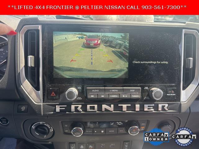 Photo of 2025 Glacier White Nissan Frontier