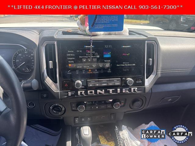 Photo of 2025 Glacier White Nissan Frontier